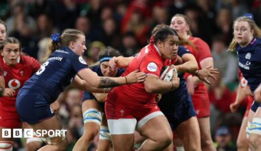 Sisilia Tuipulotu carries the ball for Wales