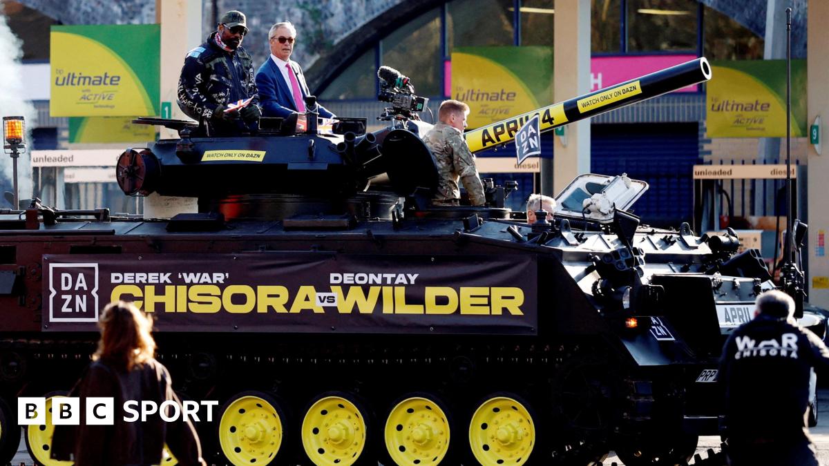 Derek Chisora and Nigel Farage on a tank