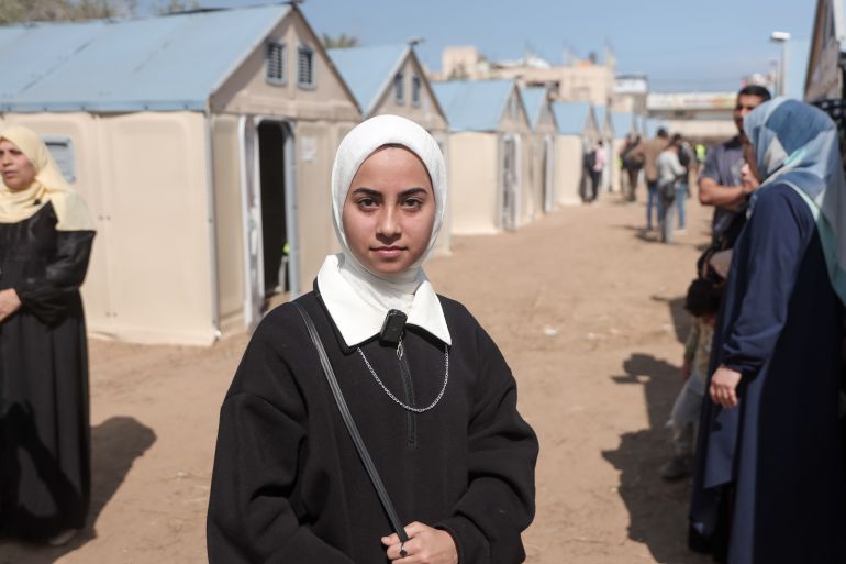 Dunia Salama, 18, came to vote in her first-ever election experience in Deir Al-Balah [Abdelhakim Abu Riash/ Al Jazeera]