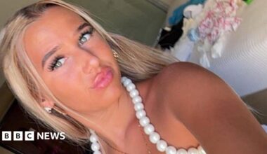 Chloe Watson Dransfield is pictured looking directly at the camera and pouting. She has long, blonde hair and is wearing a white top with beading around the neck line.