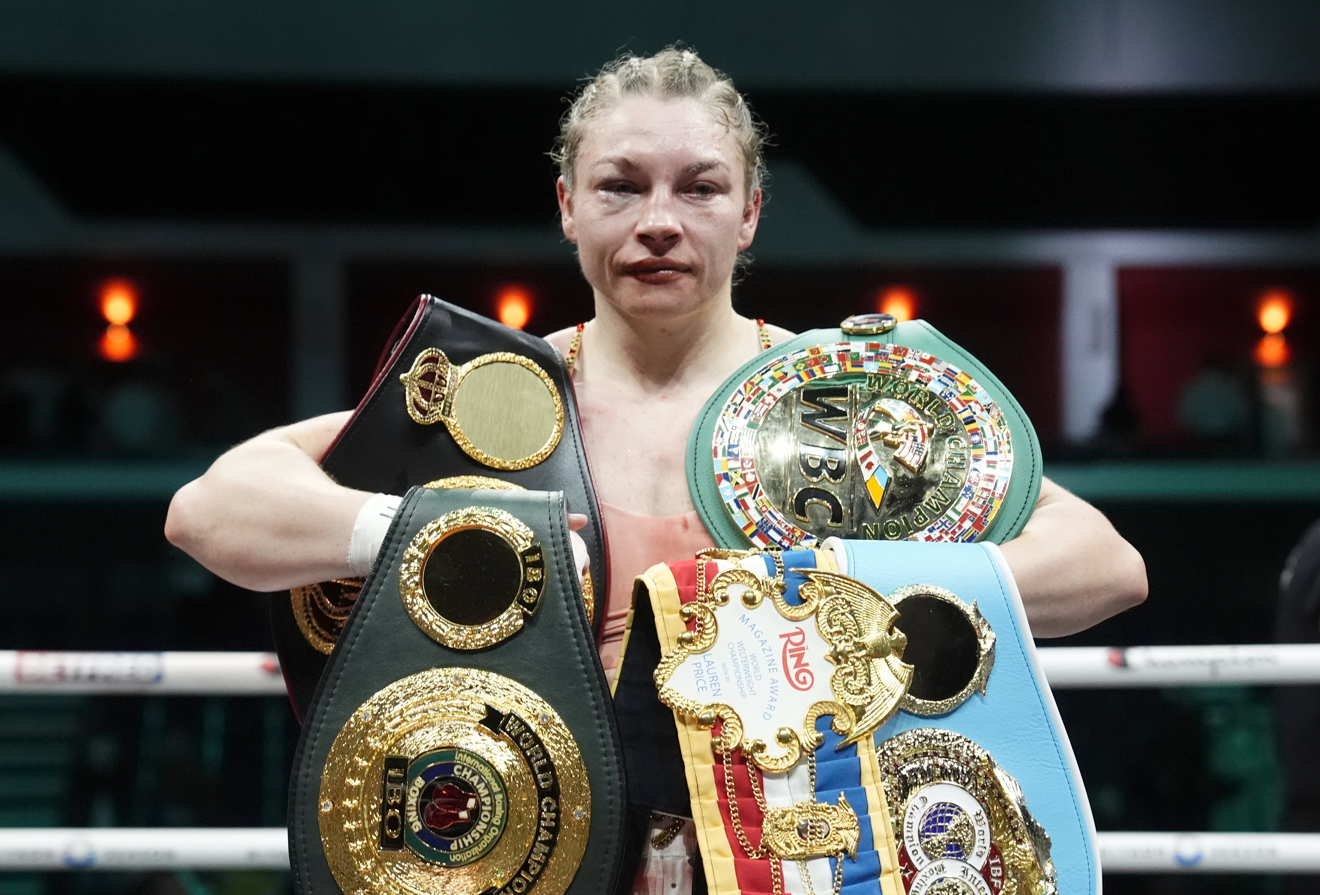 Lauren Price kept hold of her three world title belts after a unanimous points victory over Stephanie Pineiro (Nick Potts/PA)