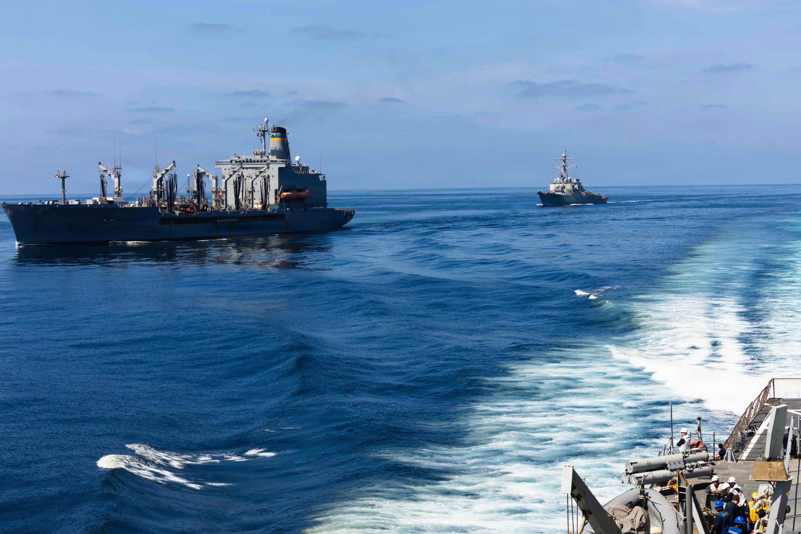 Arleigh Burke-class guided-missile destroyer USS McFaul (DDG 74) makes its approach alongside fleet replenishment oiler USNS Henry J. Kaiser (T-AO-187) for a replenishment-at-sea during Operation Epic Fury, March 27, 2026. (U.S. Navy photo)