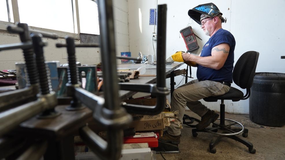 Maryland Del. Eric Bouchat, R-Carroll and Frederick counties, welding in his shop while the state's legislative session is underway. (Steve Pierce/Spotlight on Maryland)
