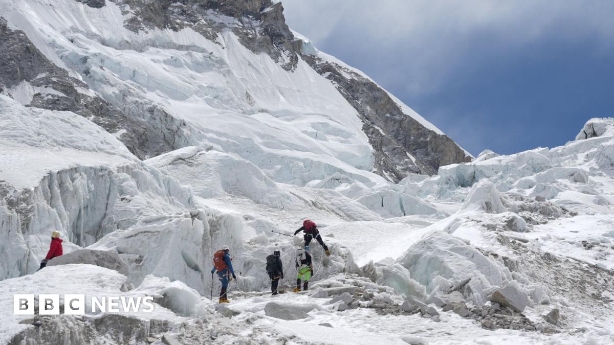 Photo showing five climbers practising at Khumbu Icefalls area before Camp I.