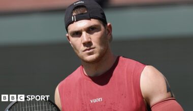 Jack Draper with a pensive expression during a tennis match