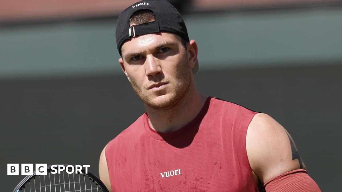 Jack Draper with a pensive expression during a tennis match