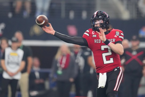 Texas Tech quarterback Behren Morton (2) throws a pass during the Big 12 Conference championship NCAA college football game between Texas Tech and BYU Saturday, Dec. 6, 2025, in Arlington, Texas. (AP Photo/Julio Cortez)