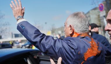 Iran's exiled crown prince splashed with red liquid after railing against ceasefire