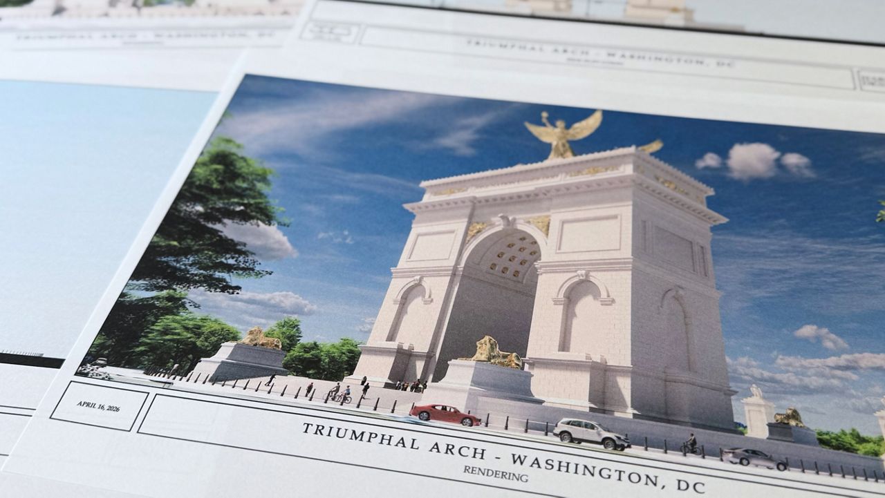 Artist renderings and diagrams for President Donald Trump's new triumphal arch released by the U.S. Commission on Fine Arts that is planned to be built in Washington between the Lincoln Memorial and Arlington National Cemetery, are photographed Friday, April 10, 2026. (AP Photo/Jon Elswick)