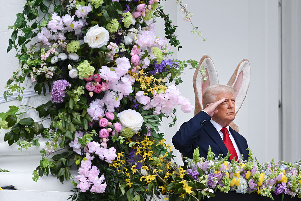 President Trump and the Easter Bunny at the White House's traditional Easter Egg Roll in 2025. His 2026 messages were less kid-friendly. (Matt McClain / Getty Images)
