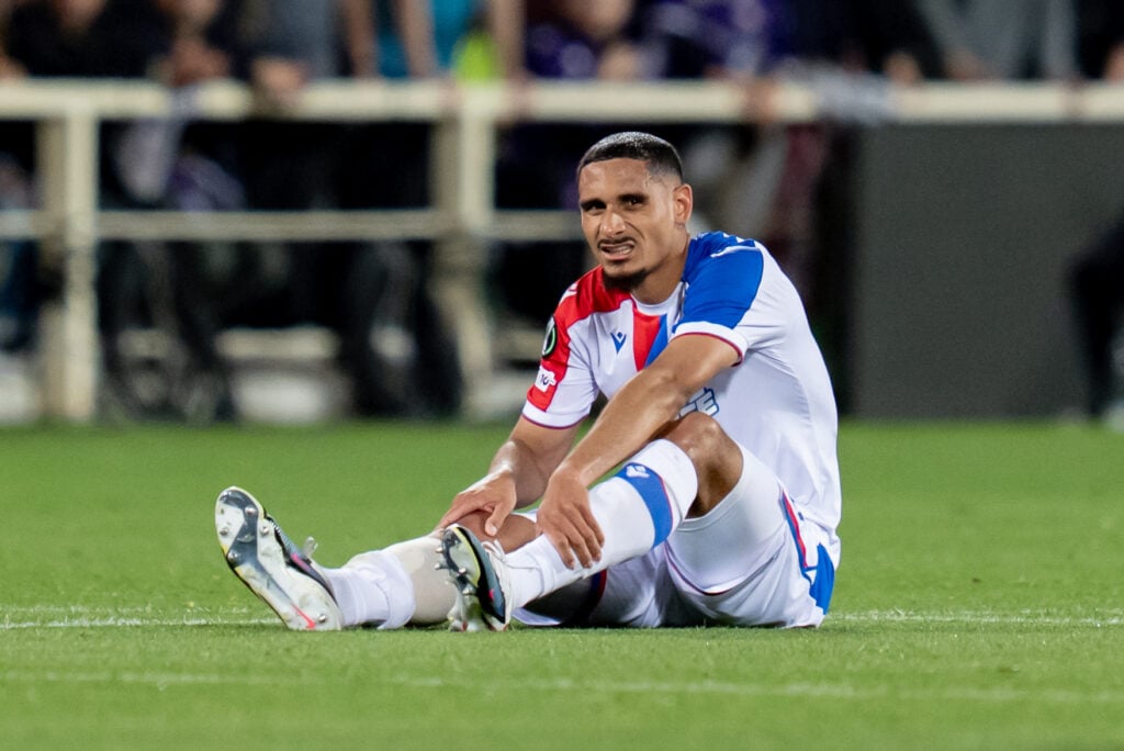 Maxence Lacroix looks injured during Crystal Palace's Conference League game against Fiorentina.