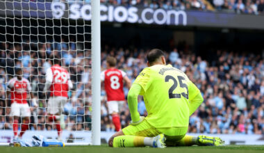 MANCHESTER, ENGLAND - APRIL 19: Gianluigi Donnarumma of Manchester City looks dejected after miss kicking his clearance straight to Kai Havertz of Arsenal (not pictured), who scores his team