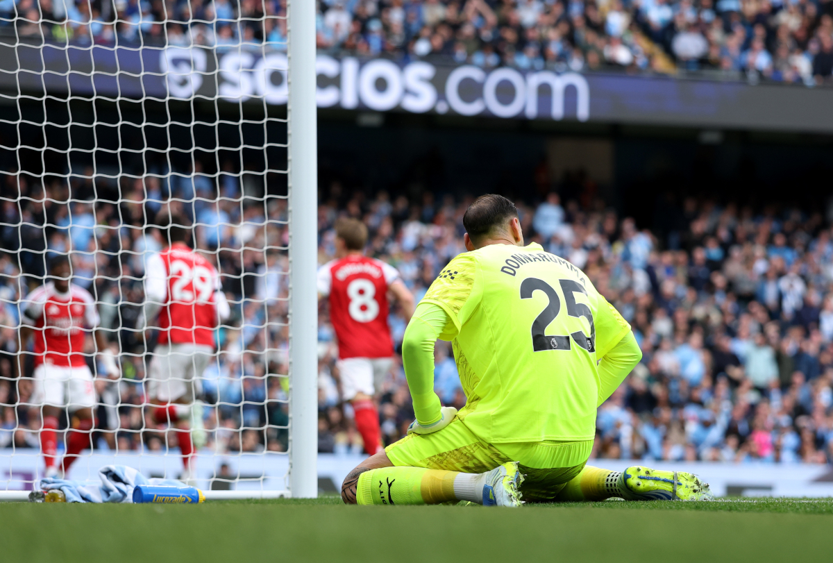 MANCHESTER, ENGLAND - APRIL 19: Gianluigi Donnarumma of Manchester City looks dejected after miss kicking his clearance straight to Kai Havertz of Arsenal (not pictured), who scores his team