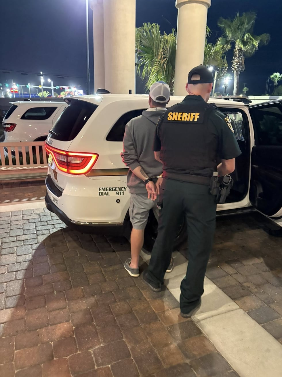 A suspect accused in an alleged Louisiana festival mass shooting plot is seen with an Okaloosa...