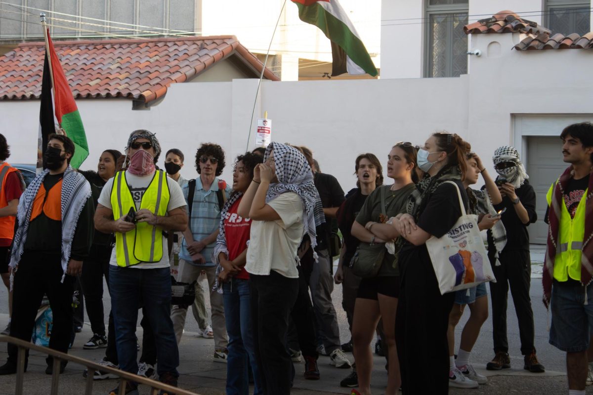 Protestors rally on Freret Street against IDF reservists speaking on campus.