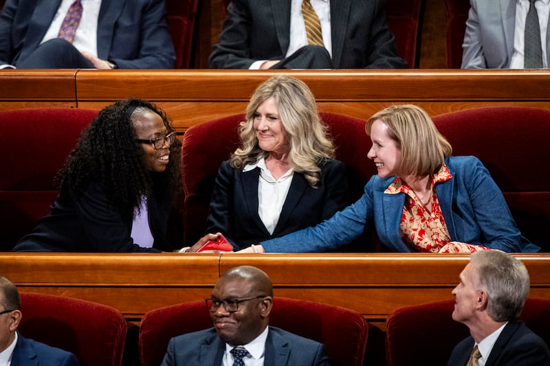Sister Amy A. Wright greets President Rosemary K. Chibota as they’re joined by Sister Theresa A. Collins in the Conference Center in Salt Lake City on Saturday, April 4, 2026.