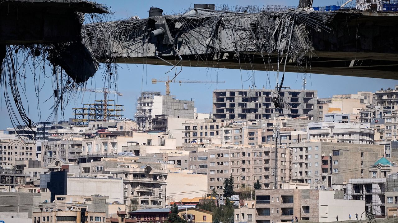 A bridge struck by U.S. airstrikes on Thursday is seen in the town of Karaj, west of Tehran, Iran, Friday, April 3, 2026. (AP Photo/Vahid Salemi)