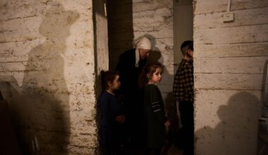 People take cover in a bomb shelter as air raid sirens warn of incoming Iranian missile strikes in Bnei Brak, Israel, Wednesday, April 1, 2026. (AP Photo/Oded Balilty)