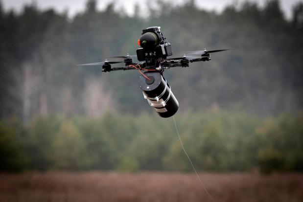 A Ukrainian-made FPV fiber-optic drone flies at a military marketplace in Ukraine.