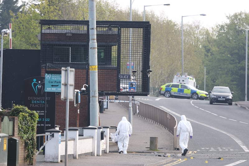 Forensics at the scene of an explosion outside Dunmurray Police Station. PICTURE: MAL MCCANN m