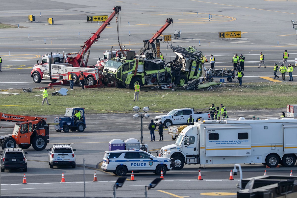 Firefighter heard warning to stop before deadly Air Canada crash at LaGuardia