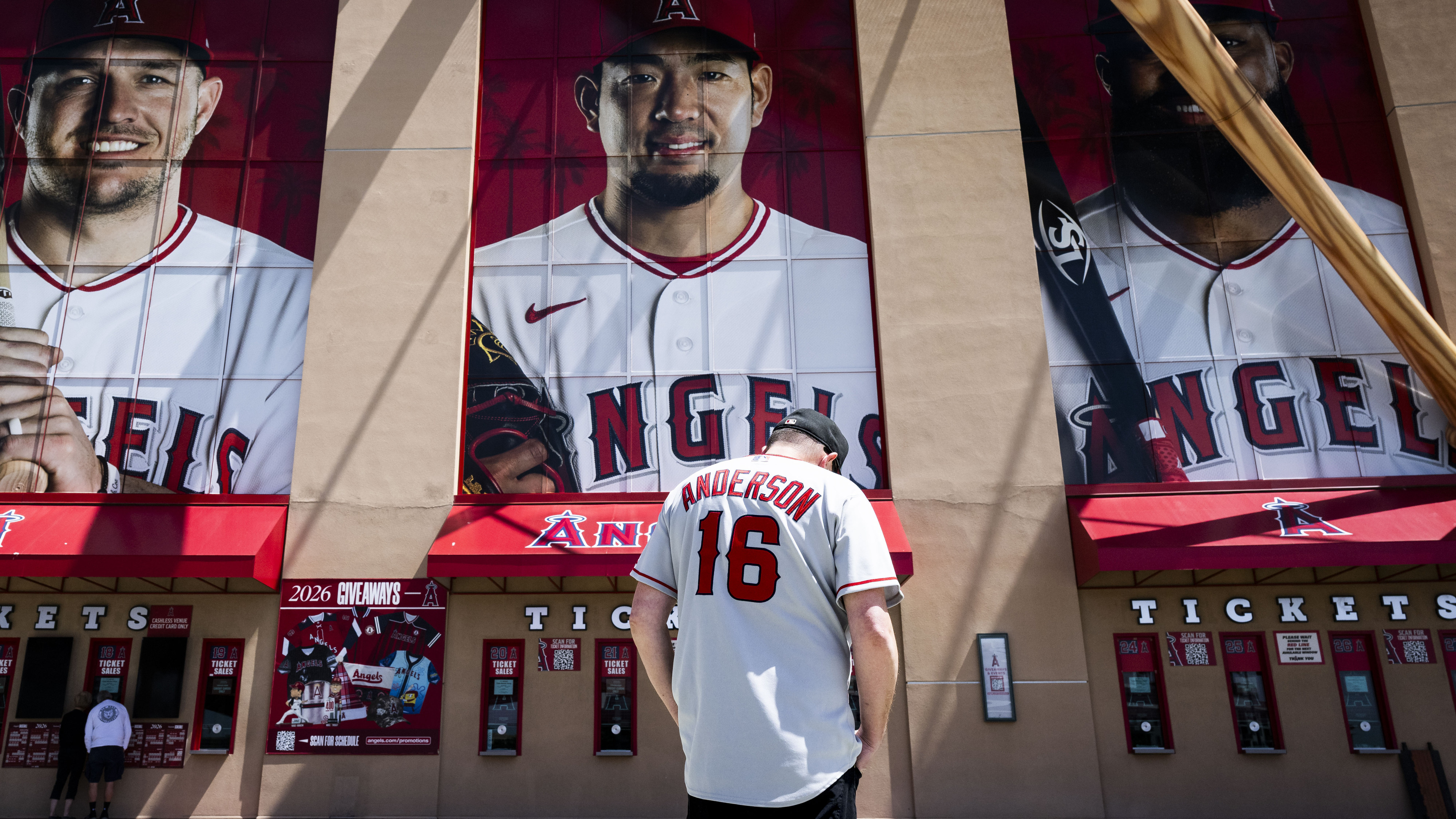 Rob Rohm pauses outside Angel Stadium to pay respects to...