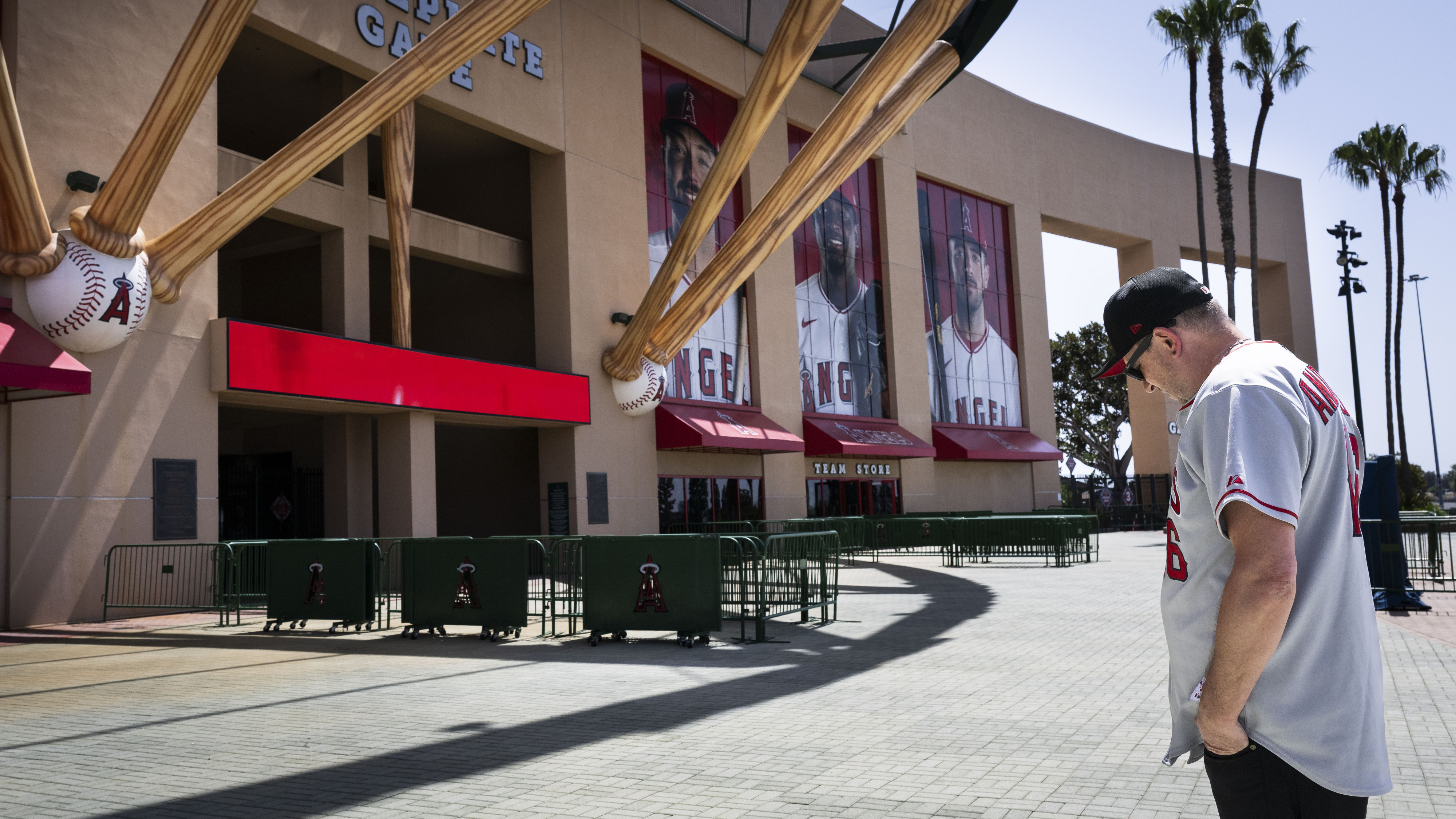 Rob Rohm pauses outside Angel Stadium to pay respects to...