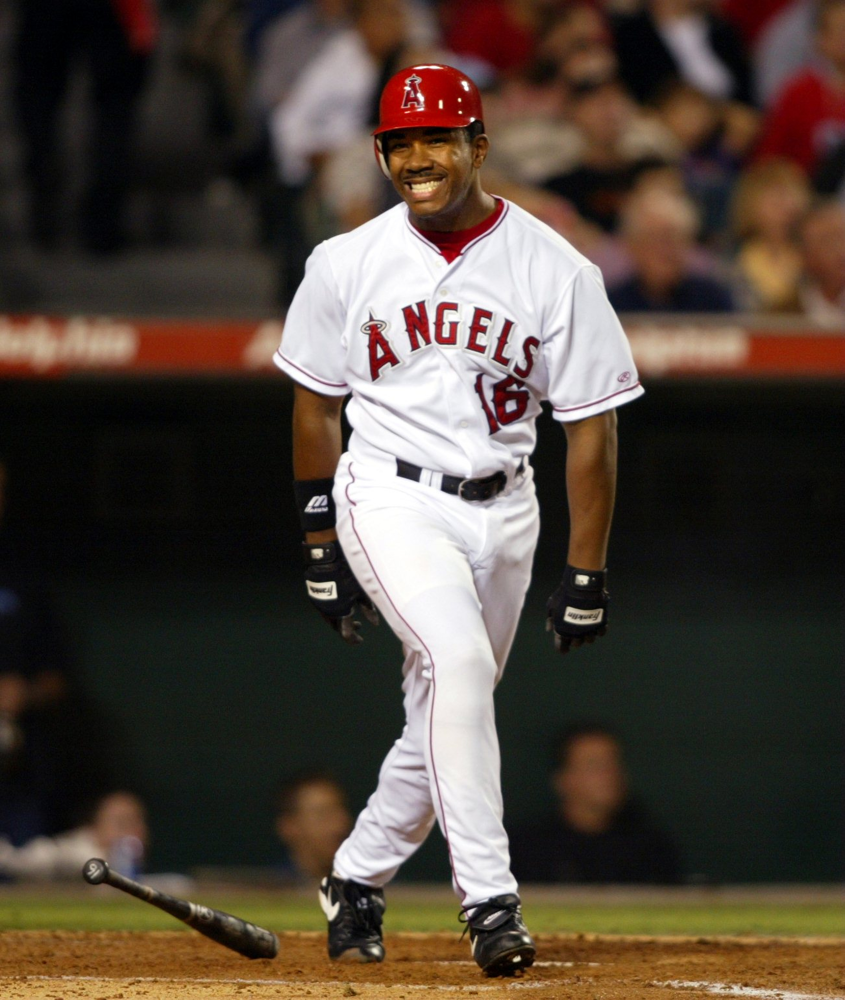Angelsâ centerfielder Garret Anderson grimaces after hitting an fly ball...
