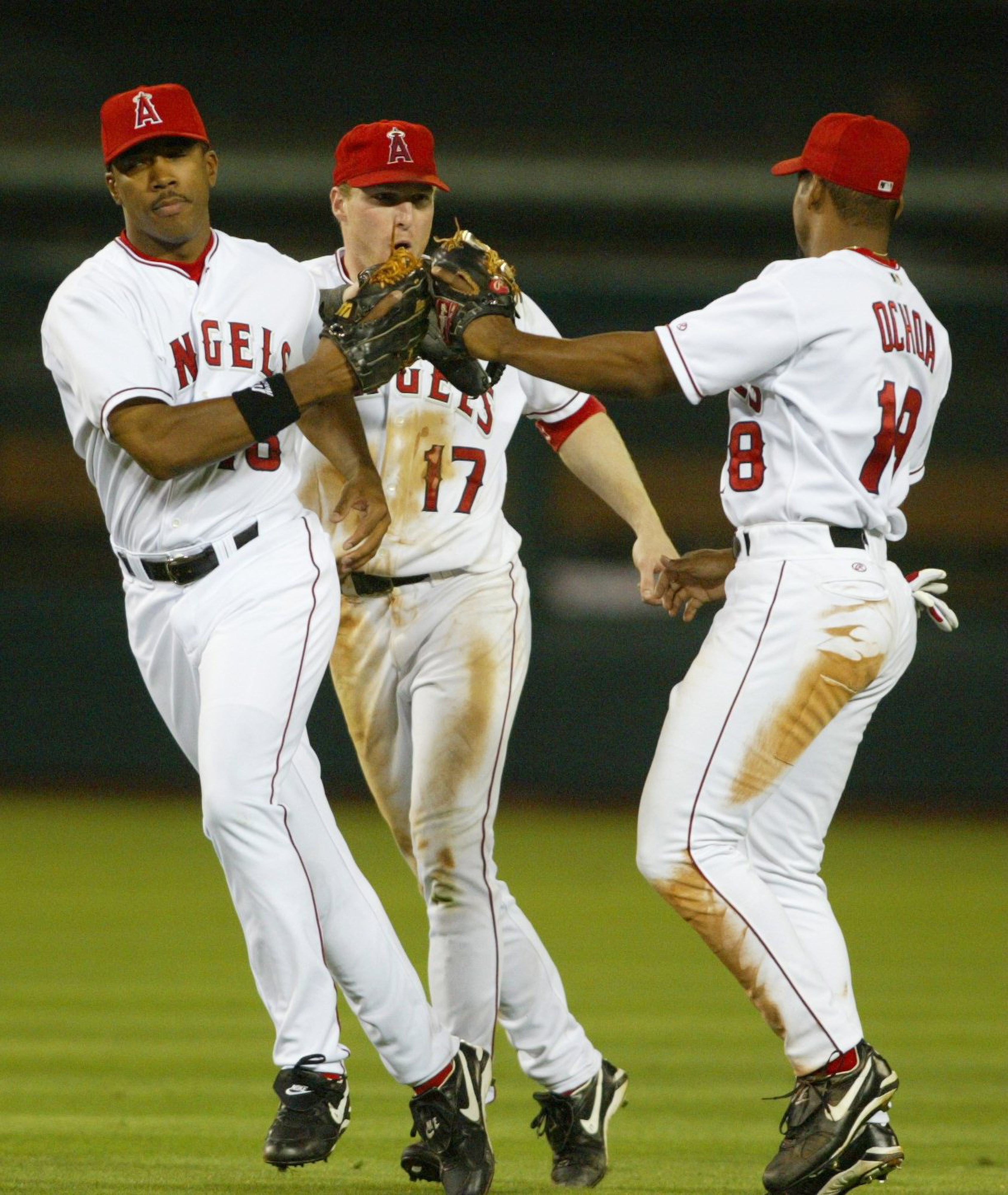 Garret Anderson (16), Darin Erstad (17) and Alex Ochoa (18)...