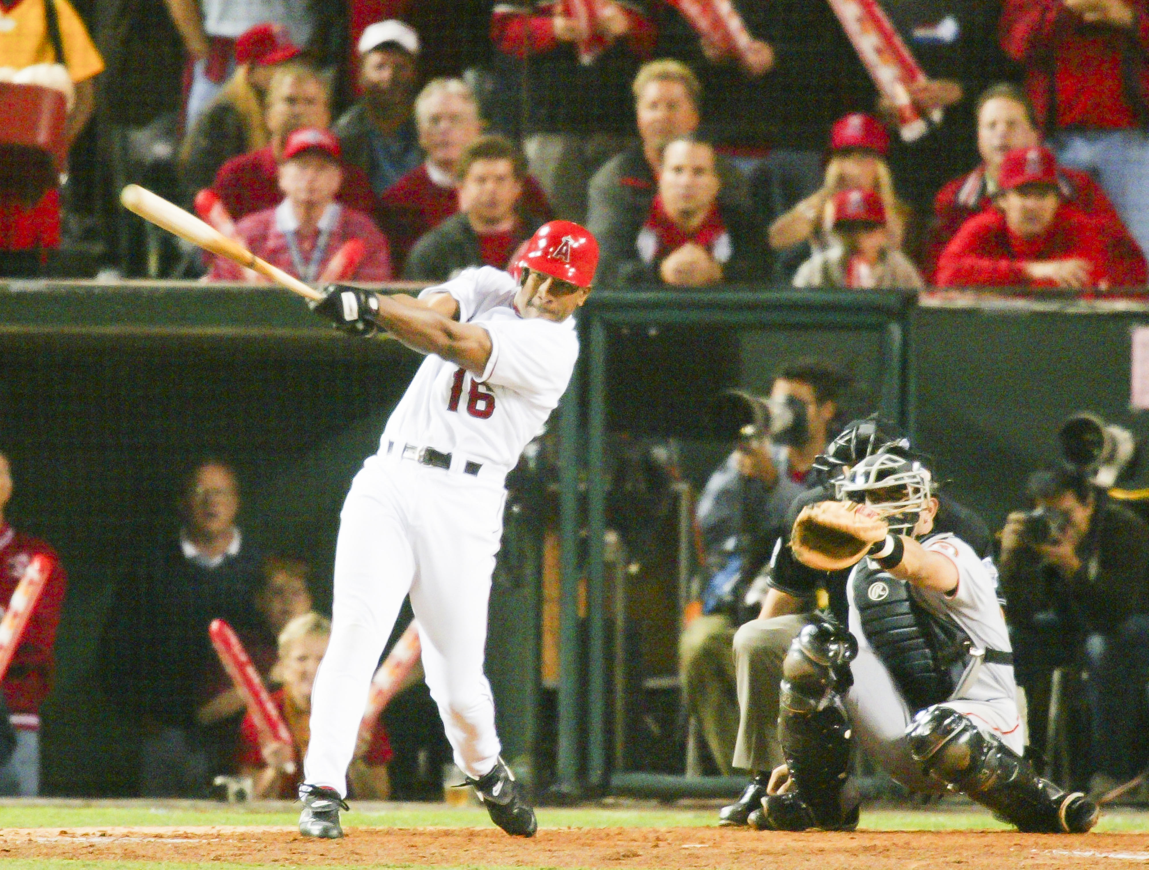 Garret Anderson of the Angels doubles during the 3rd inning...