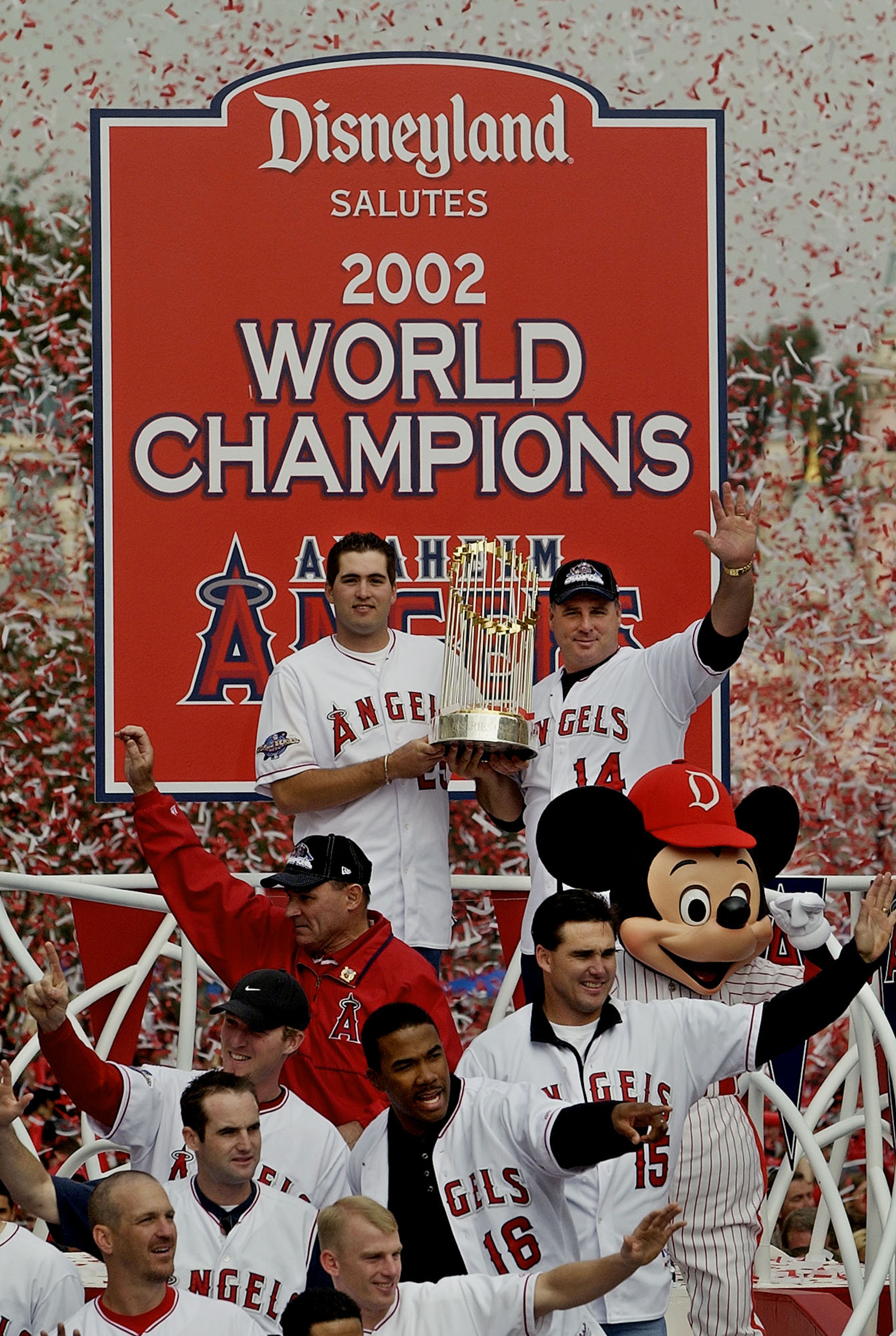 Anaheim Angels manager Mike Scioscia, top right, and 2002 World...