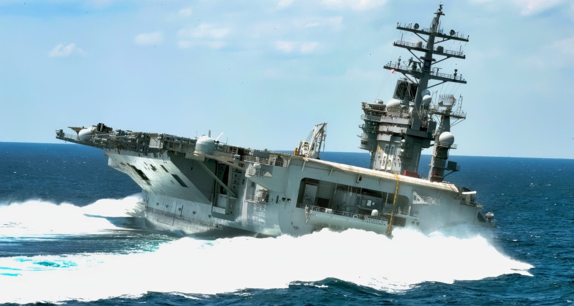ATLANTIC OCEAN (June 14, 2011) The Nimitz-class aircraft carrier USS Dwight D. Eisenhower (CVN 69) conducts rudder turns during sea trials. Dwight D. Eisenhower completed a nine-month planned incremental availability at Norfolk Naval Ship Yard on June 10 and is scheduled to resume underway operations this summer. (U.S. Navy photo by Mass Communication Specialist 1st Class Christopher Stoltz/Released)