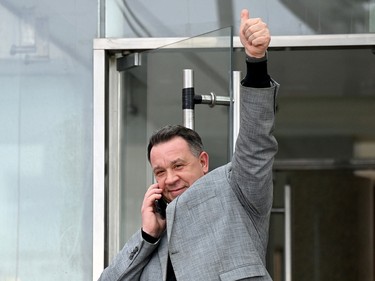 David Pelicot celebrates the conviction of his father's abuse of his mother Gisele Pelicot, on the courthouse steps