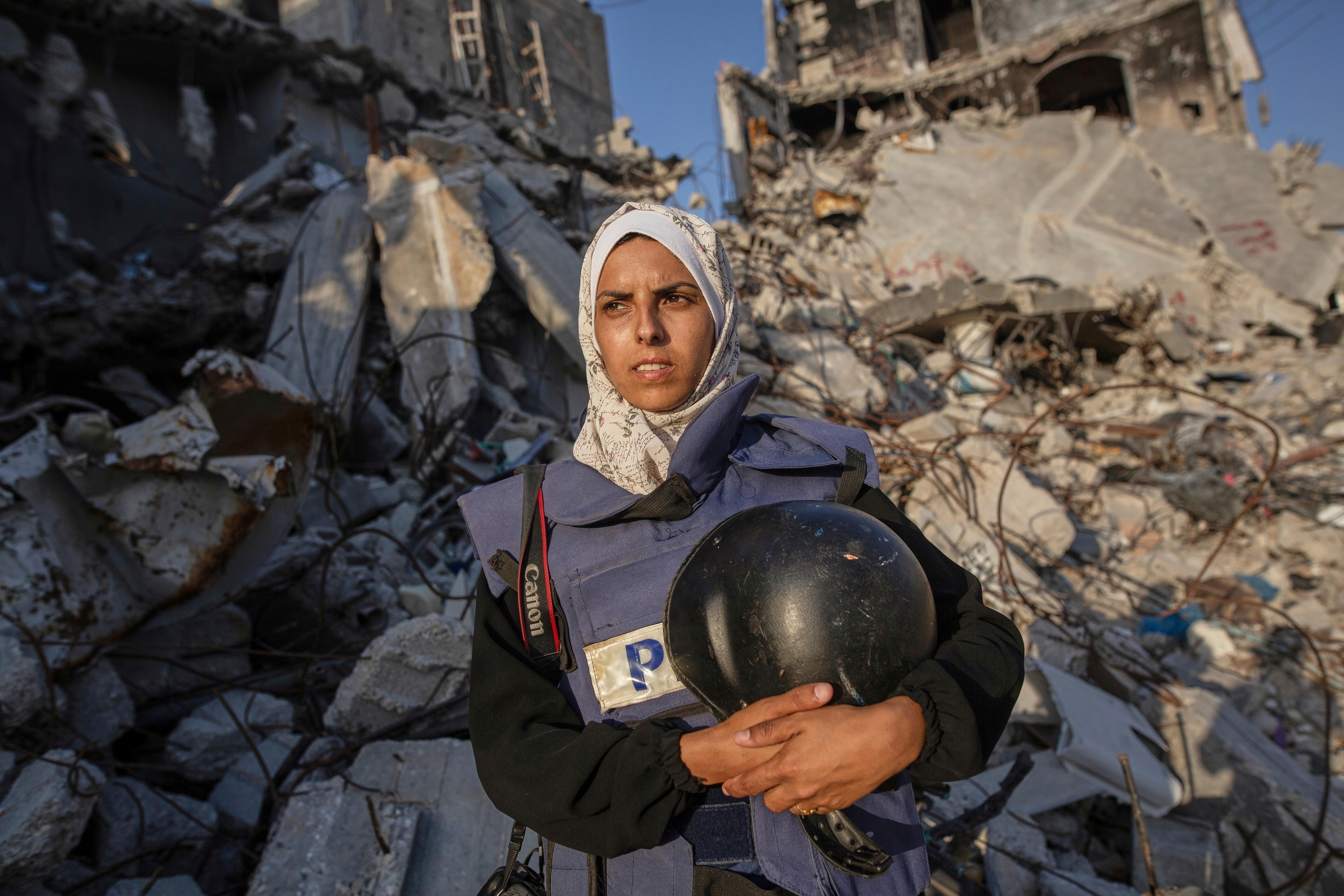 Freelance journalist Mariam Dagga poses for a portrait in Khan Younis, southern Gaza Strip.