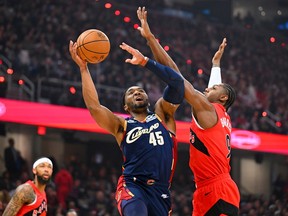 Cleveland's Donovan Mitchell #45 of the Cleveland Cavaliers shoots over RJ Barrett of the Toronto Raptors during Game 2 of their NBA playoff series Monday night.