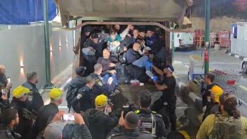 More than 60 Palestinians found packed inside a garbage truck