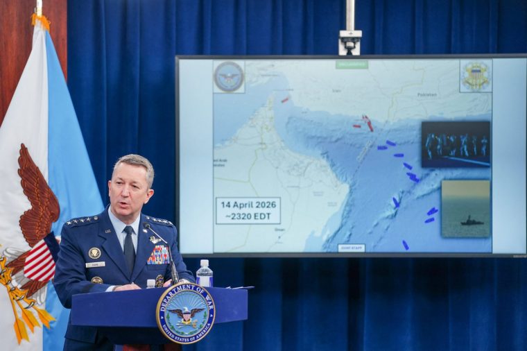 Chairman of the Joint Chiefs of Staff General Dan Caine speaks next to a map showing a blockade line on the Strait of Hormuz, during a briefing on the Iran war at the Pentagon in Washington, D.C., U.S., April 16, 2026. REUTERS/Nathan Howard