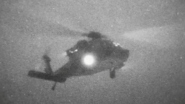 A helicopter carries U.S. Marines from the amphibious assault ship USS Tripoli at an unknown location, in what the U.S. Central Command (CENTCOM) says is an operation to board and seize Iranian-flagged cargo ship M/V Touska, in this screen grab taken from a handout video released on April 20, 2026. U.S. Central Command via X/Handout via REUTERS THIS IMAGE HAS BEEN SUPPLIED BY A THIRD PARTY. MANDATORY CREDIT VERIFICATION: - Location and date could not be verified - No older version of the video was found posted before April 20