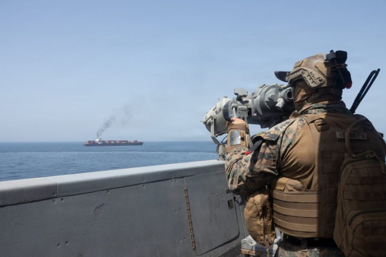 ARABIAN SEA - APRIL 20: (EDITOR'S NOTE: This Handout image was provided by a third-party organization and may not adhere to Getty Images' editorial policy.) In this handout photo provided by U.S. Central Command, U.S. forces patrol the Arabian Sea near M/V Touska on April 20, 2026, after firing upon the Iranian-flagged vessel that the U.S. accused of attempting to violate the U.S. naval blockade of Iranian ports near the Strait of Hormuz. (Handout Photo by the U.S. Navy via Getty Images)