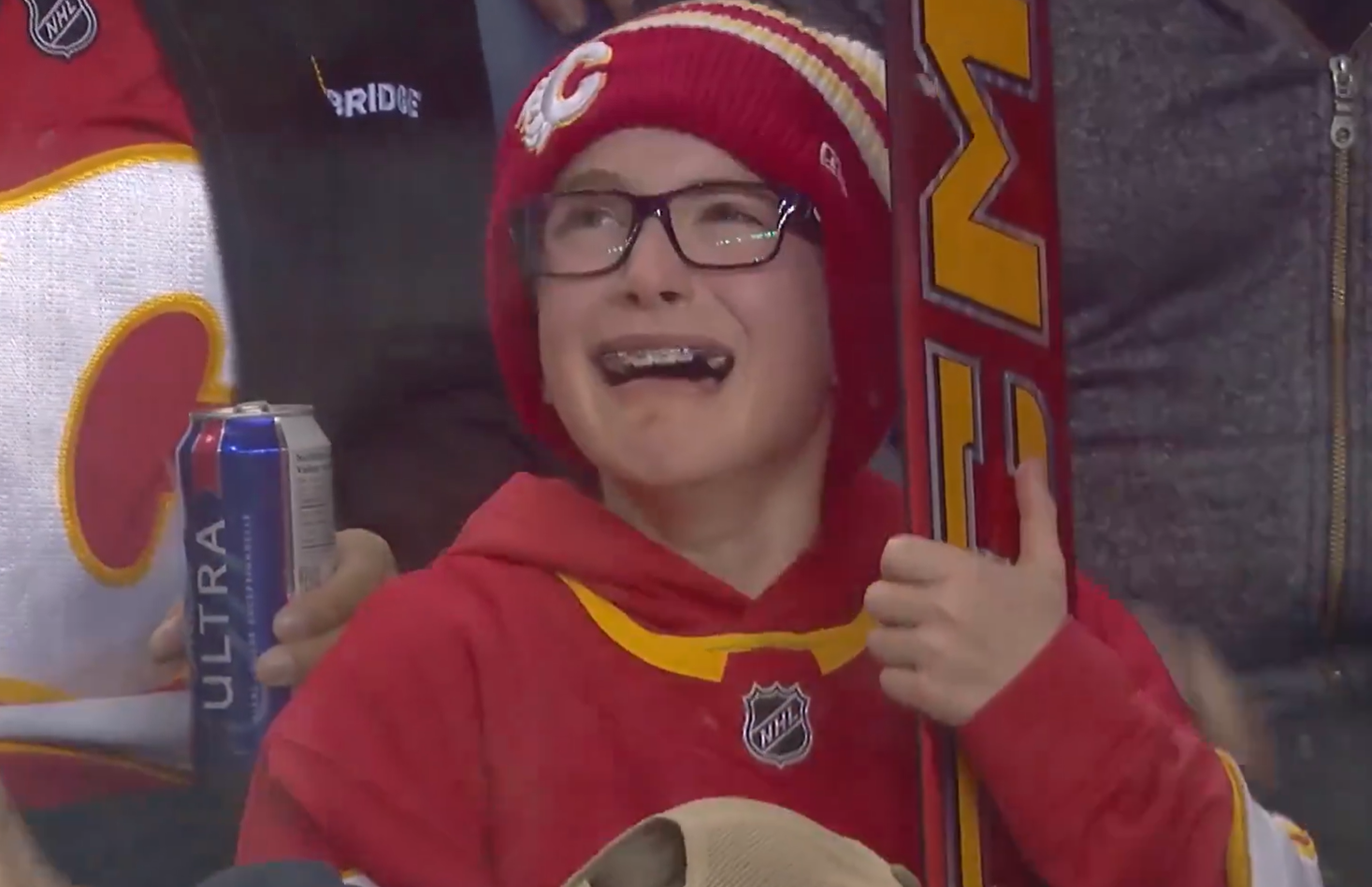 Calgary Flames fan brought to tears after Dustin Wolf gifts goalie stick
