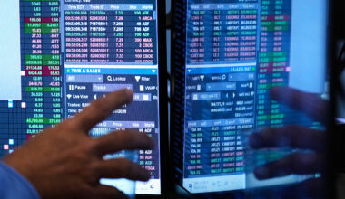 People work on the floor at the New York Stock Exchange.