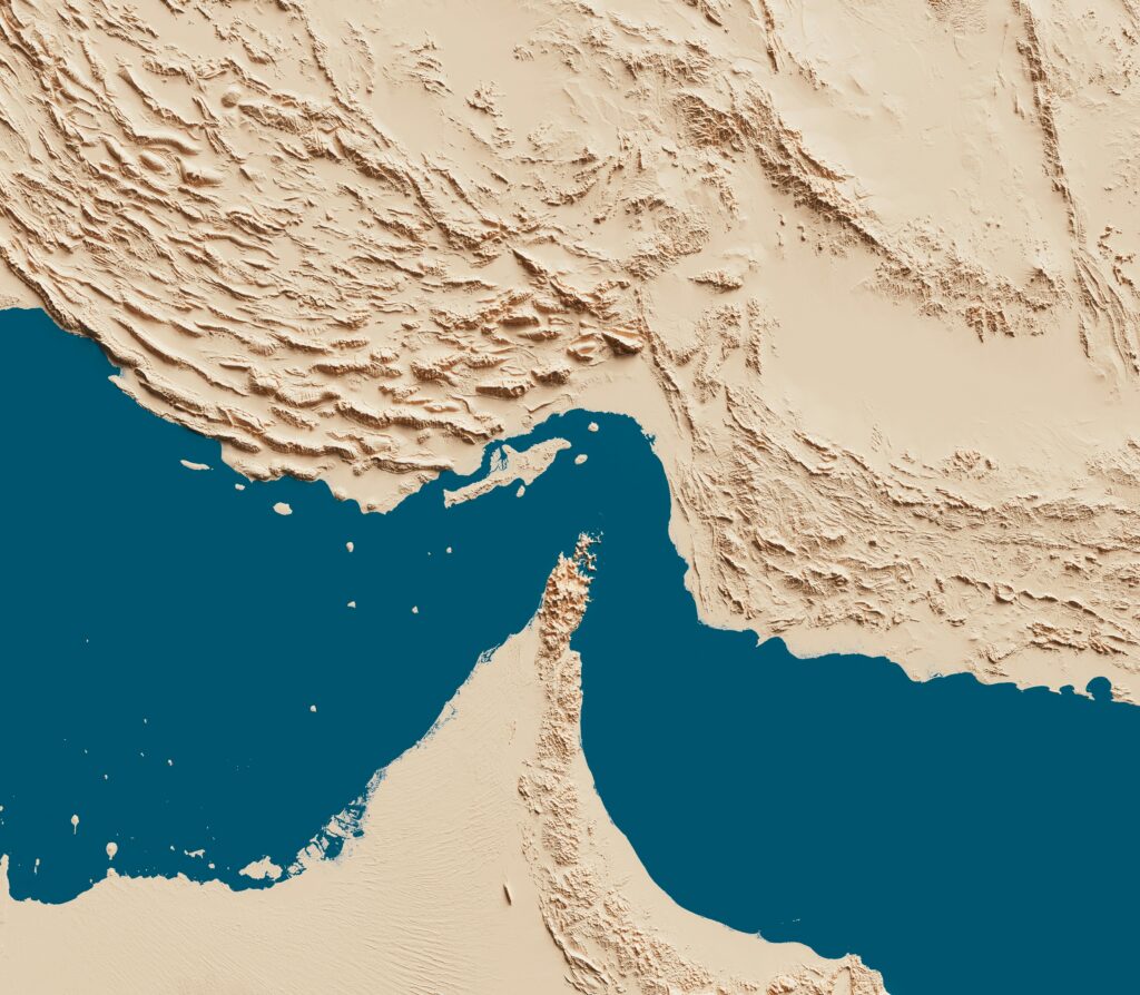 Image shows overhead view of the Strait of Hormuz.