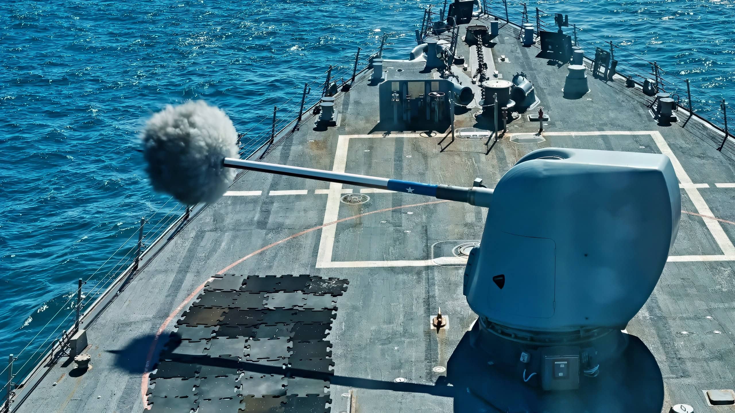 (Oct. 3, 2025) – Arleigh Burke-class guided-missile destroyer USS Gonzalez (DDG 66), fires the Mk45 5-inch gun system while underway as part of the Titans of the Sea Presidential Review. The Titans of the Sea Presidential Review is one of many events taking place throughout the country to showcase maritime capabilities as part of the U.S. Navy’s 250th birthday. America is a maritime nation. For 250 years, America’s Warfighting Navy has sailed the globe in defense of freedom. (U.S. Navy photo by Mass Communication Specialist Seaman Jayden Howard)