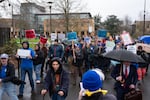 Portland Community College’s Federation of Faculty and Academic Professionals and Federation of Classified Employees union members chant as they march through the Portland Community College Cascade campus in Northeast Portland, Ore., while on strike on March 11, 2026.