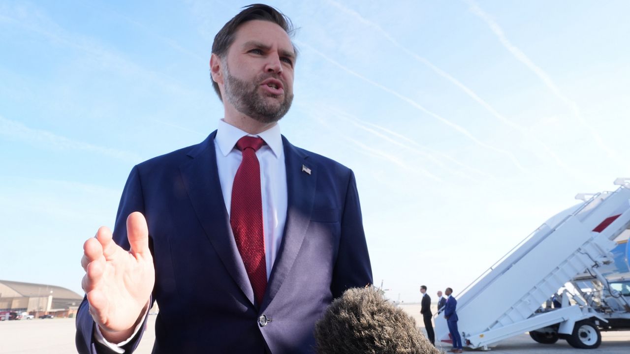 Vice President JD Vance speaks to the press before boarding Air Force Two, Friday, April 10, 2026, at Joint Base Andrews, Md., for expected departure to Pakistan, for talks on Iran. (AP Photo/Jacquelyn Martin, pool)