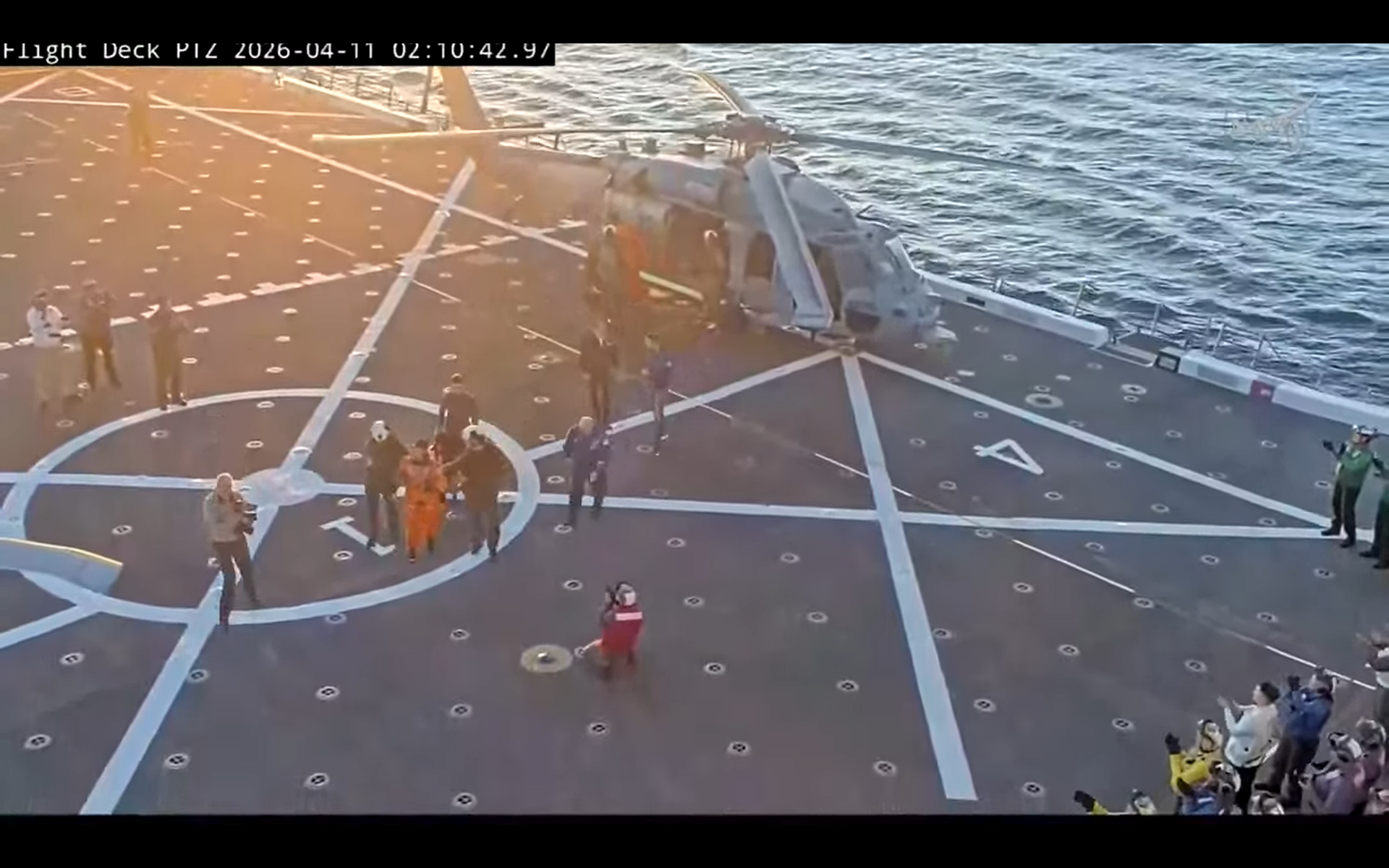 artemis 2 astronaut christina koch waves after recovery