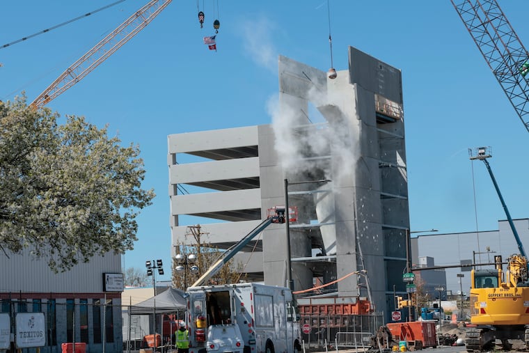 Recovery and demolition operations continued Saturday at the site of the partially collapsed garage in Grays Ferry.