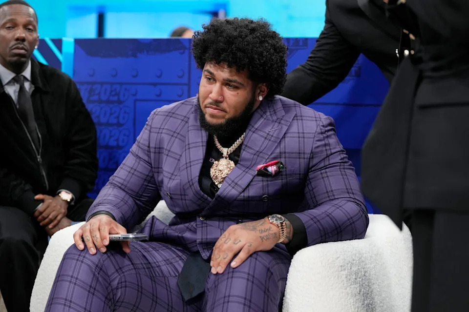 Alabama defensive lineman Kadyn Proctor reacts after being chosen 12th overall by the Miami Dolphins in the green room.