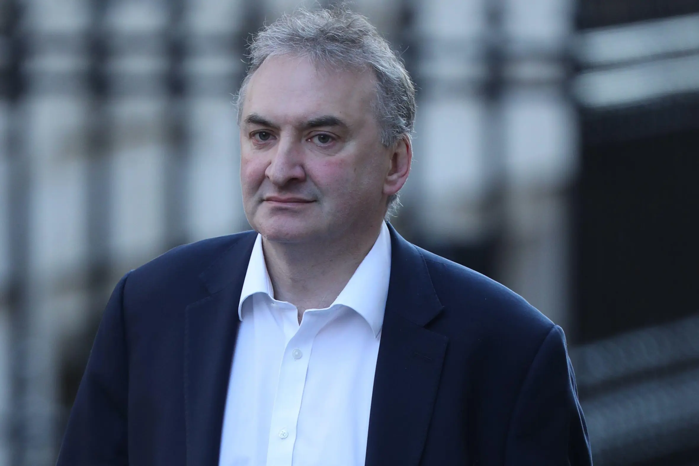 Sir Chris Wormald, Permanent Secretary at the Department of Health, walking in Downing Street.