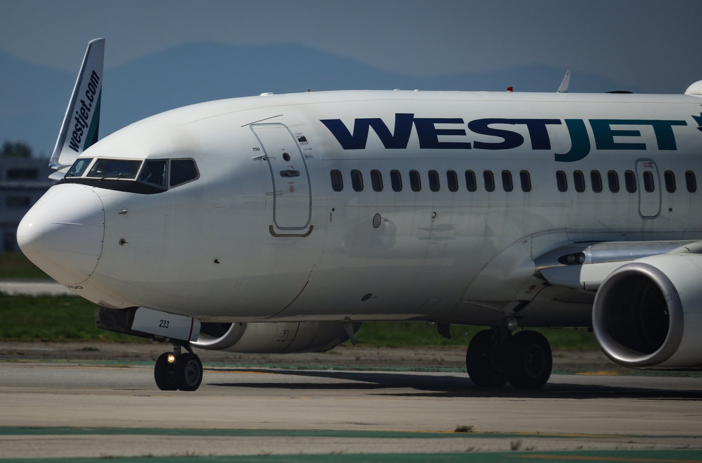 WestJet joins Air Canada in increasing fees for checked baggage